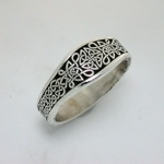 Narrow Tapered Love Knot Wedding Band #657C - Shown in Sterling Silver with Black Antiquing